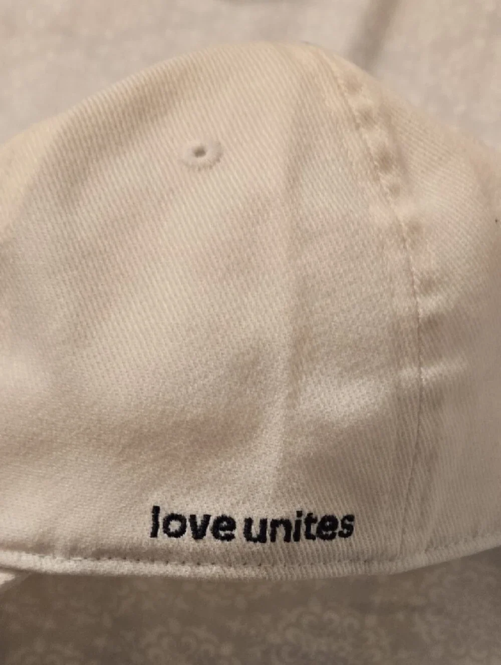 NWT Adidas Originals cap features rainbow-colored embroidered trefoil log.